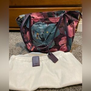 Tumi over the shoulder bag floral pattern